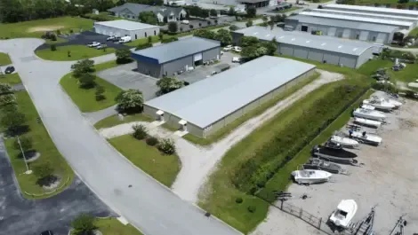 Aerial view of multiple self-storage facility buildings with drive-up units