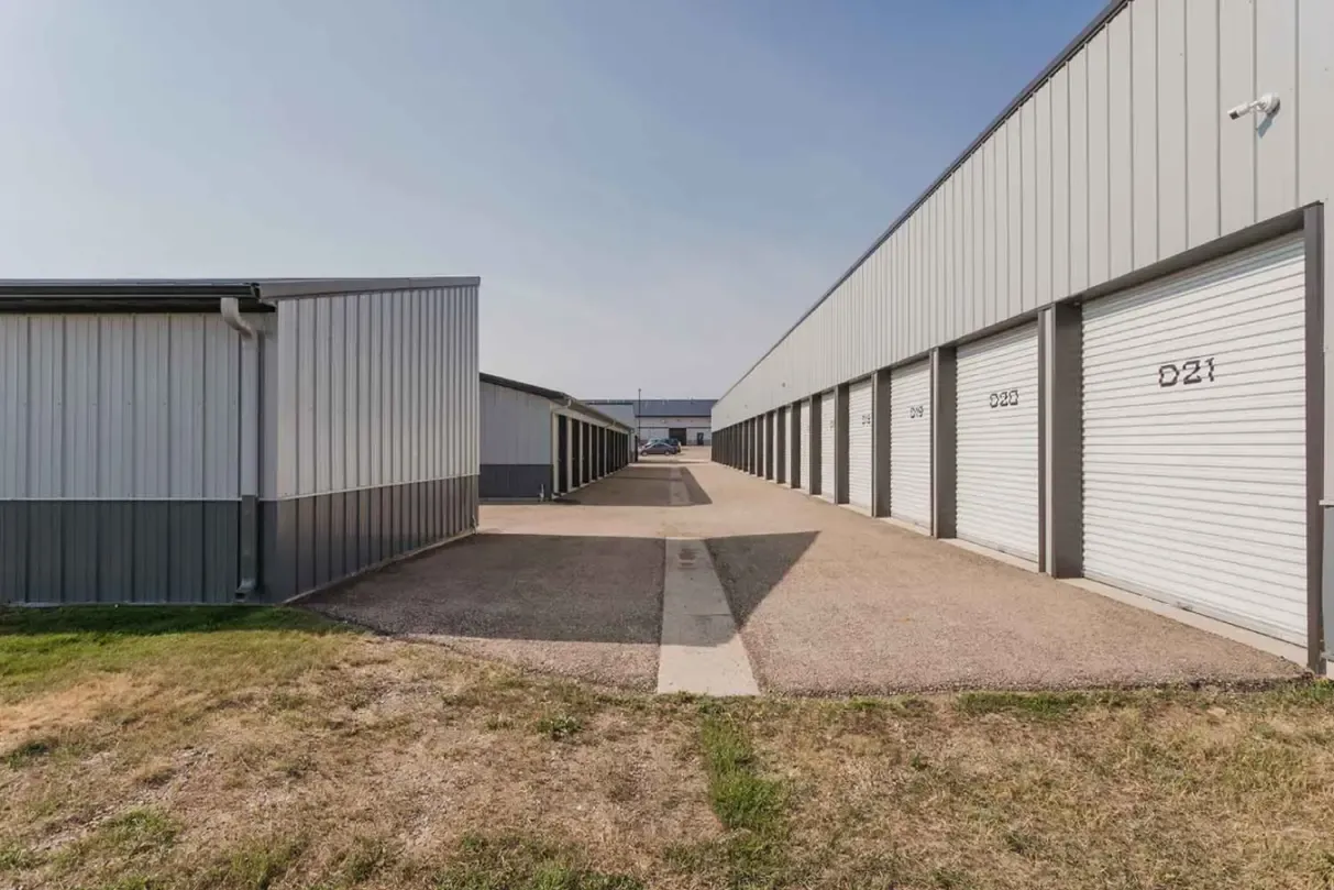 A row of storage units and drainage.