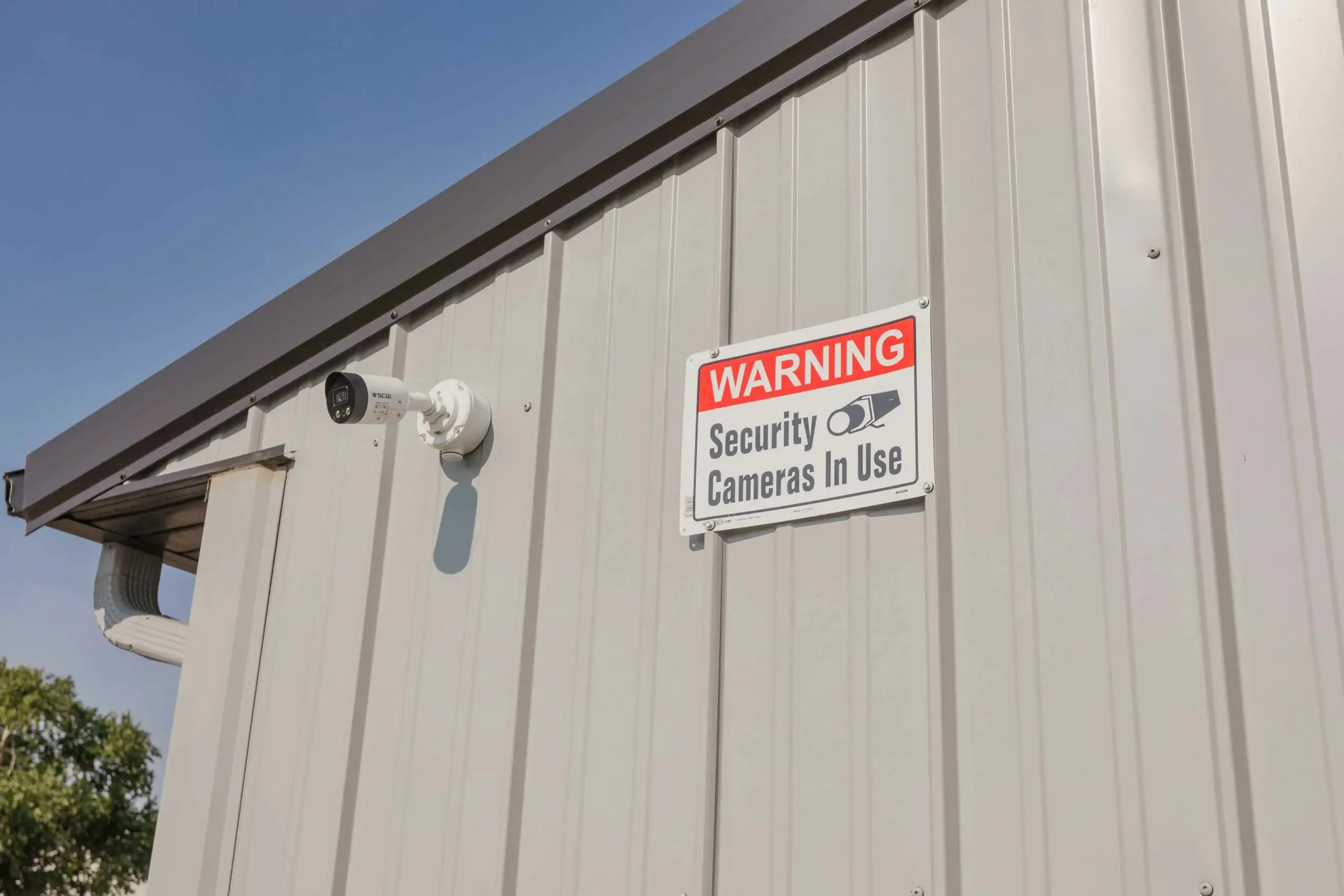A security camera on a unit building.