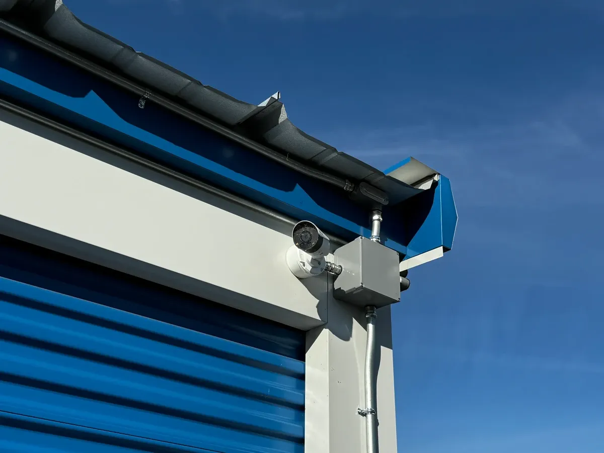 A security camera on one of the unit buildings.