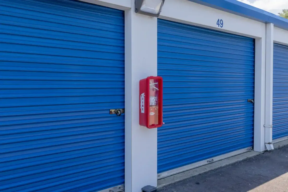 fire extinguisher attached to storage unit building