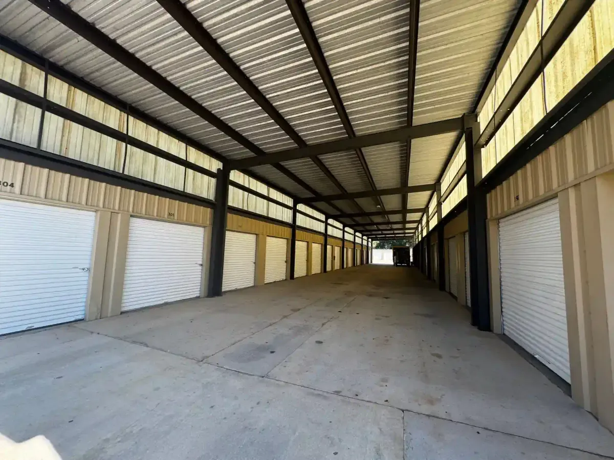 Covered aisle of storage units.