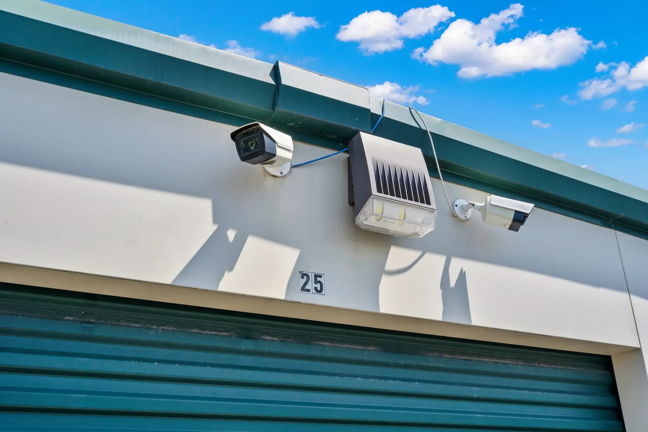 A security camera above unit 25.